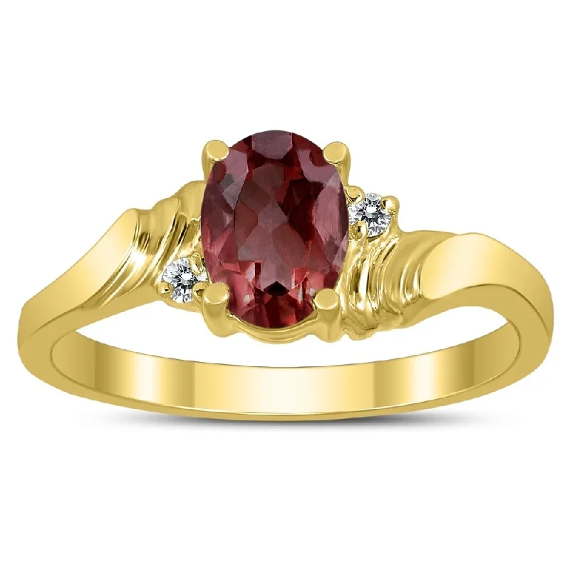 7X5MM Garnet and Diamond Wave Ring in 10K Yellow Gold