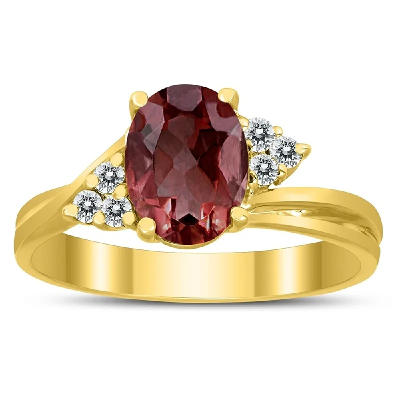 8X6MM Garnet and Diamond Twist Ring in 10K Yellow Gold