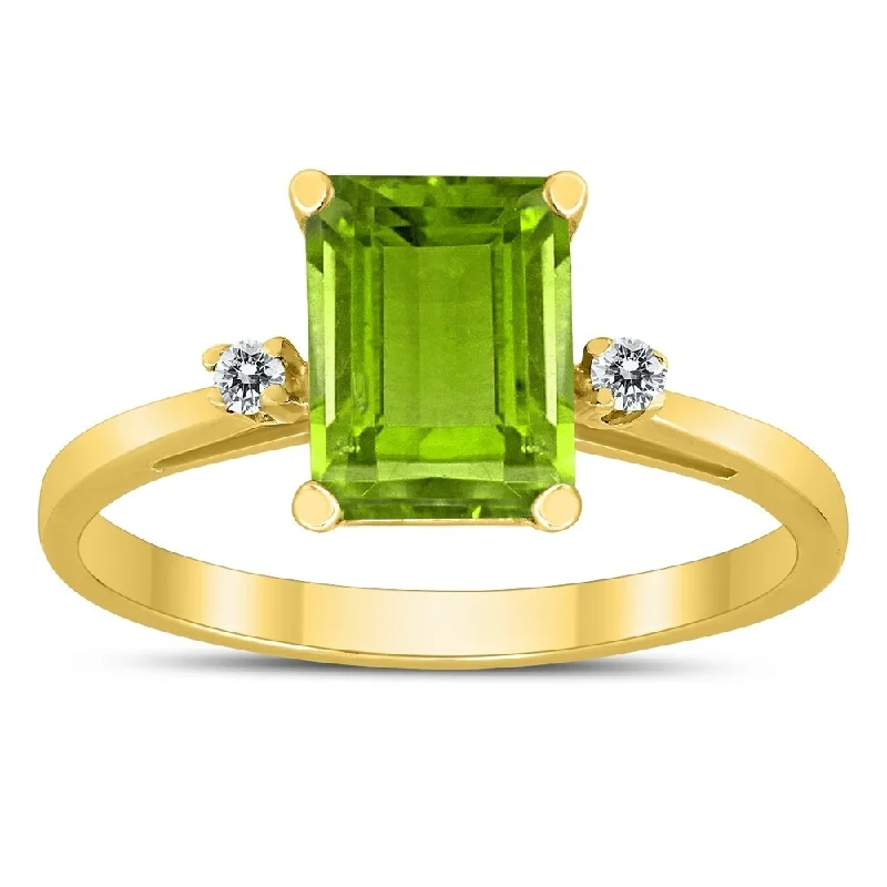 Emerald Cut 8X6MM Peridot and Diamond Three Stone Ring in 10K Yellow Gold