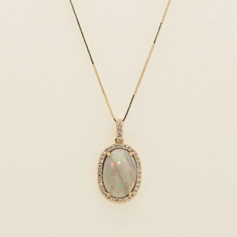 Oval Black Opal Necklace in 14kt Yellow Gold with Diamonds (1/4ct tw)