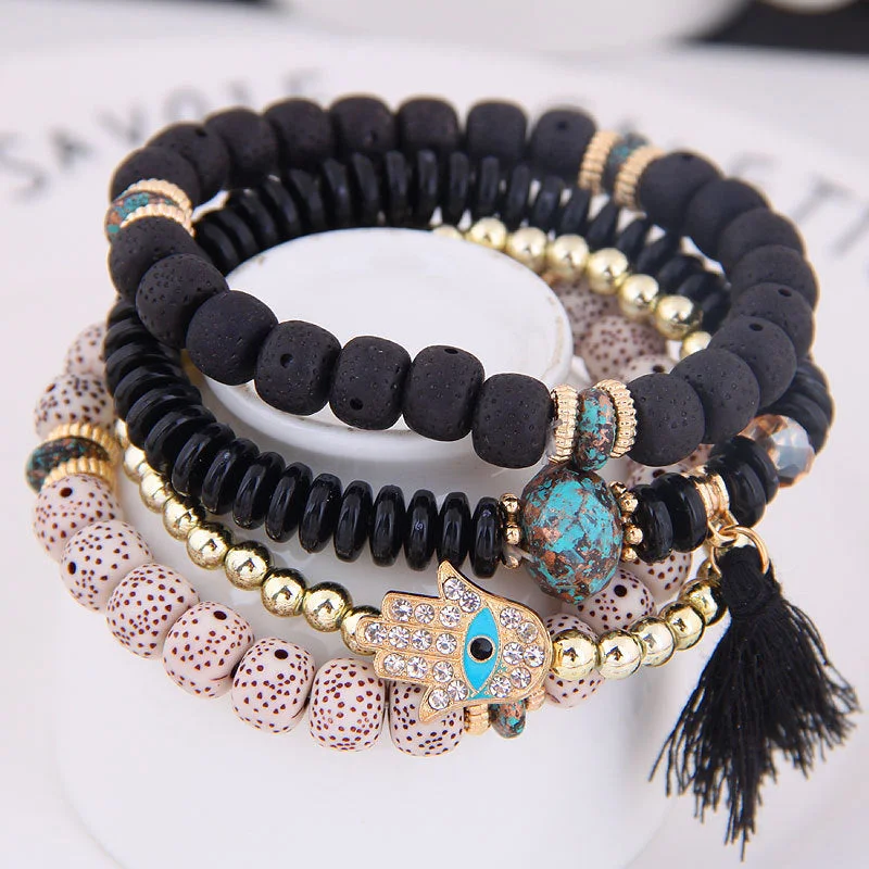 Wholesale Evil Blue Eyes Tassel Alloy Bracelet